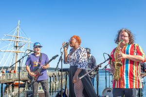 Musicians in front of water Port Townsend live music